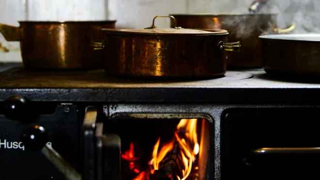 cooking on a wood-burning cooker
